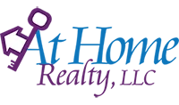 Logo van At Home Realty