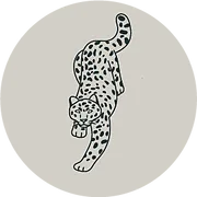 Snow Leopard Barbershop logo