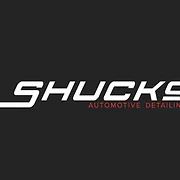 Yrityksen Shucks Auto Wash logo