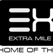 Yrityksen Extra Mile International Inc Trucking Company logo